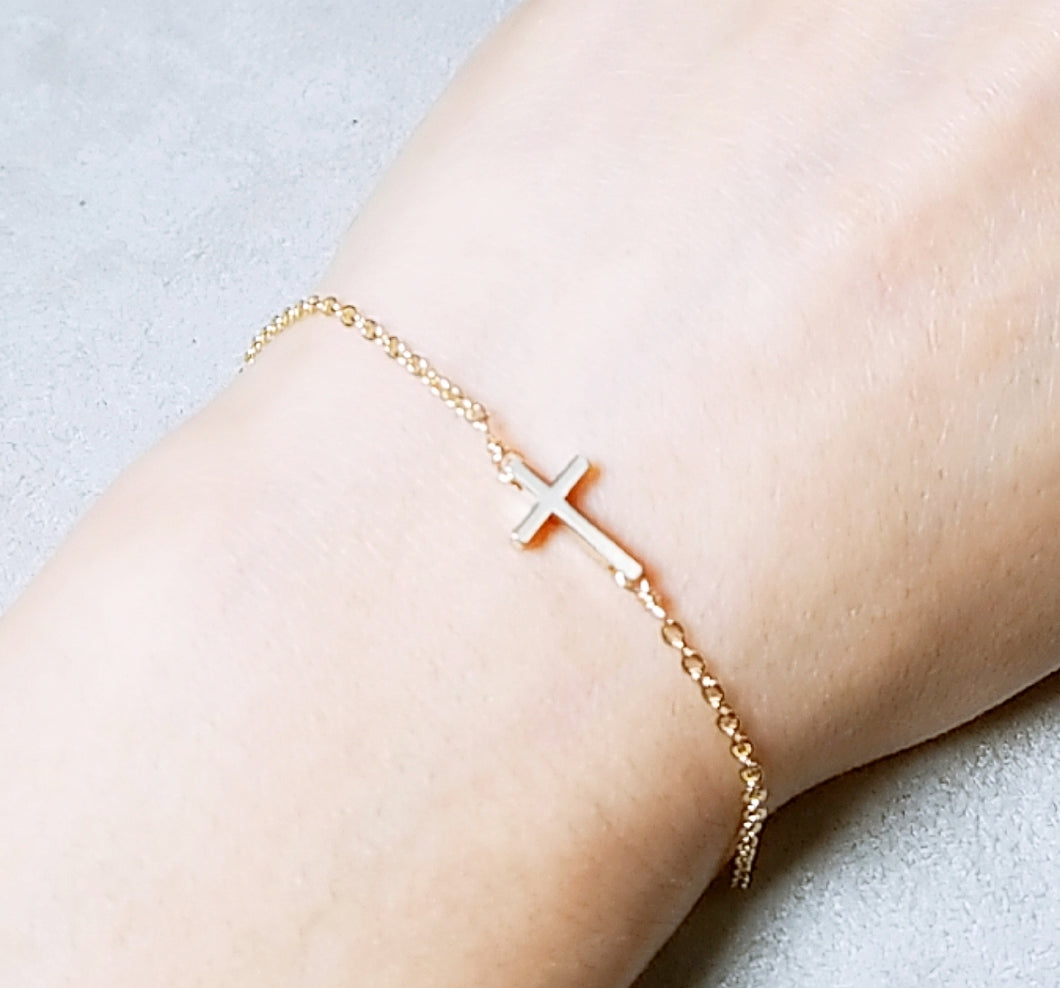 Cross gold bracelet